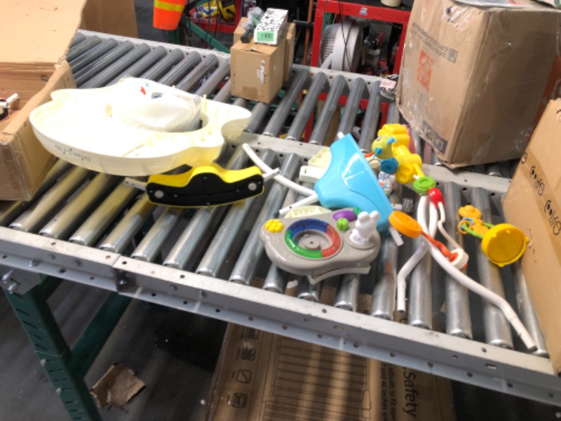 Photo 1 of *USED-MISSING PARTS - SEE PICTURES*Dream On Me Zany 2-in-1 Baby Activity Center and Bouncer in Star Print, Sturdy and Strong Frame, 3 Height Positions, 360° Rotating Seat, 12 Songs with Flash Lights