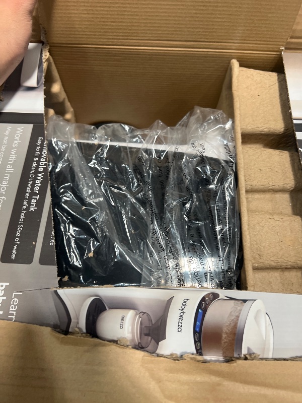 Photo 1 of Baby Brezza New and Improved Formula Pro Advanced Formula Dispenser Machine - Automatically Mix a Warm Formula Bottle Instantly - Easily Make Bottle with Automatic Powder Blending, White