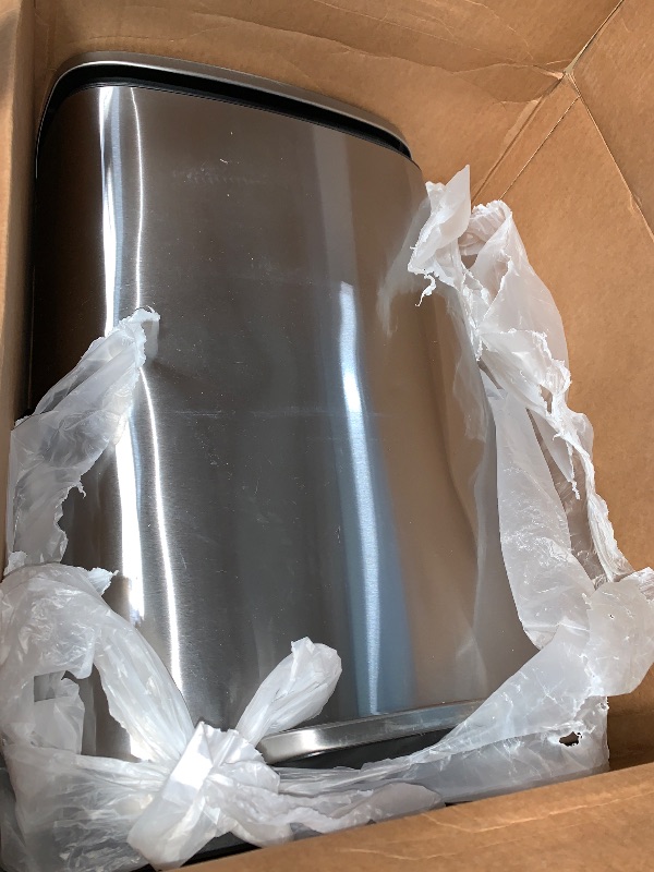 Photo 1 of (minor dent) Amazon Basics Smudge Resistant Rectangular Trash Can With Soft-Close Foot Pedal, Brushed Stainless Steel, 50 liter/13.2 gallon, Satin Nickel Finish, 16.7"L x 14.7"W x 25.9"H