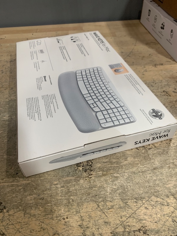 Photo 1 of Logitech Wave Keys for Mac, Wireless Ergonomic Keyboard with Cushioned Palm Rest, Comfortable Natural Typing, Bluetooth Keyboard, Easy-Switch, Optimized for Mac, Apple, iPad - Off White