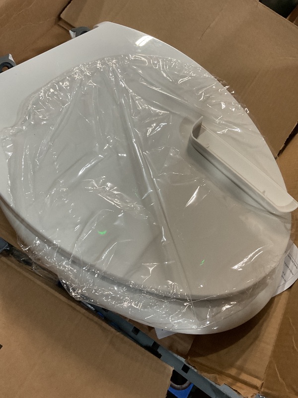 Photo 1 of (Missing pieces )  K-27331-0 Glissade ReadyLatch Quiet Close Elongated Toilet Seat, White, Grip-Tight bumpers prevent shifting