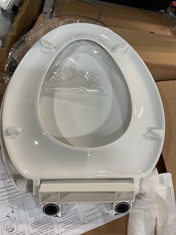 Photo 1 of (Missing pieces )  K-27331-0 Glissade ReadyLatch Quiet Close Elongated Toilet Seat, White, Grip-Tight bumpers prevent shifting