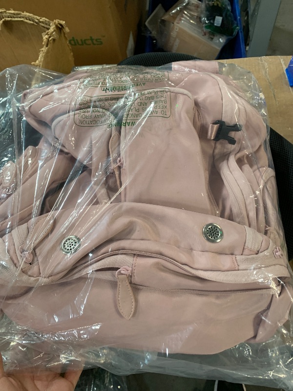 Photo 1 of (BAGGED) (USED/FAIR) Taygeer Vacuum Backpack, Expandable Vacuum Seal Carry on Backpack with Rain Cover, 17'' laptop Compression Backpacks Travel with Shoe Compartment, TSA Approved Personal Item Compression Back Pack,Pink