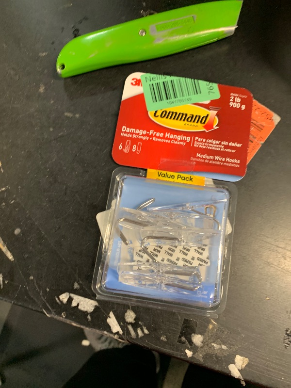 Photo 1 of Command Medium Clear Wire Toggle Hooks, 6 Hooks and 8 Command Strips, Damage Free Hanging Wall Hangers for Hanging Home Decor, Holds up to 2 lb