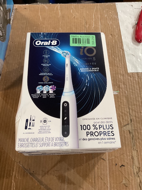 Photo 1 of Oral-B iO Deep Clean + Whiten Rechargeable Electric Toothbrush with Visible Pressure Sensor, 2 Minute Timer, 5 Cleaning Settings, 1 iO5 Limited, 3 Toothbrush Heads, Travel Case & Refill Holder, White
