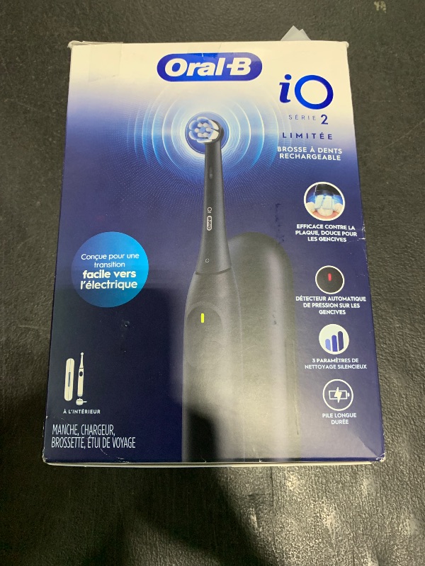 Photo 1 of Oral-B iO Simple Clean Rechargeable Electric Powered Toothbrush, Night Black with 1 Gentle Care Brush Head and 1 Black Travel Case - Automatic Pressure Sensor to Protect Gums - 3 Modes - 2 Min Timer