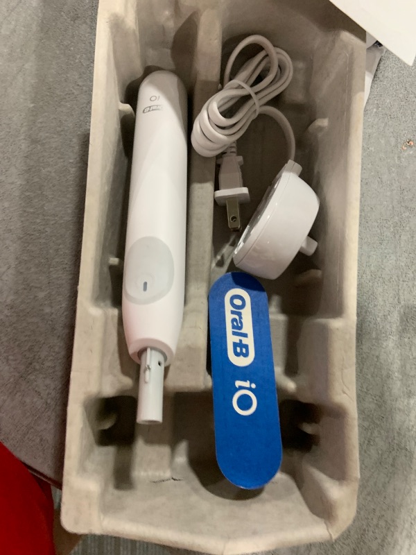 Photo 1 of Oral-B iO Series 2 Rechargeable Electric Powered Toothbrush Starter Kit, Pure White with 2 Brush Heads - Automatic Pressure Sensor to Protect Gums - 3 Modes - 2 Min Timer