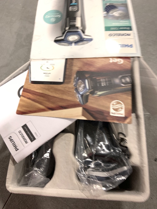 Photo 1 of Philips Norelco Shaver 7200, Rechargeable Wet & Dry Electric Shaver with SenseIQ Technology and Pop-up Trimmer, S7887/82