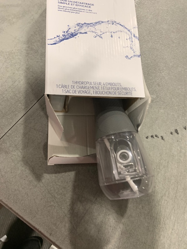 Photo 1 of Waterpik Cordless Advanced 2.0 Water Flosser For Teeth, Gums, Braces, Dental Care With Travel Bag and 4 Tips, ADA Accepted, Rechargeable, Portable, and Waterproof, Gray WP-587, Packaging May Vary