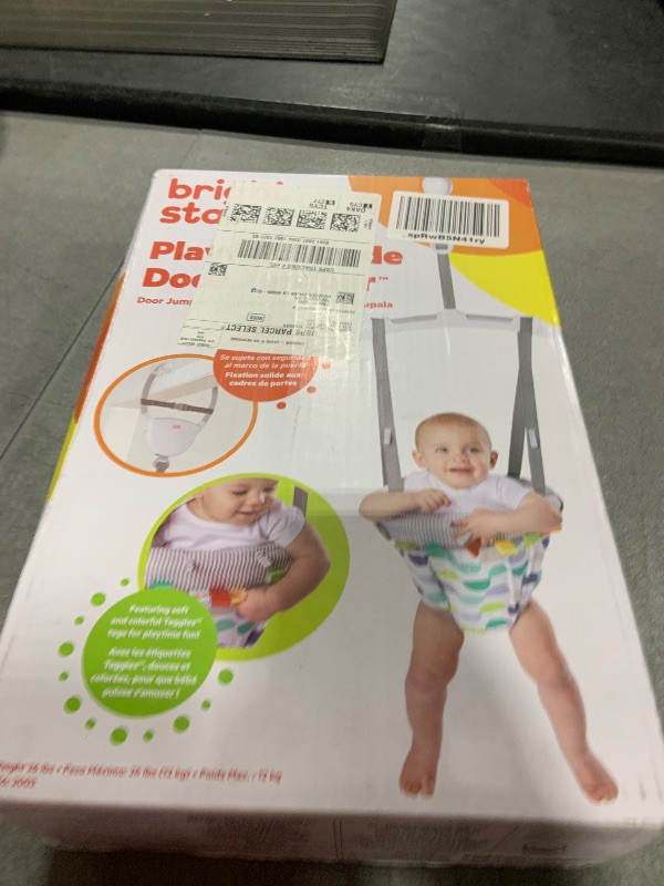 Photo 1 of Bright Starts Playful Parade Door Jumper for Baby with Adjustable Strap, 6 Months and Up, Max Weight 26 lbs