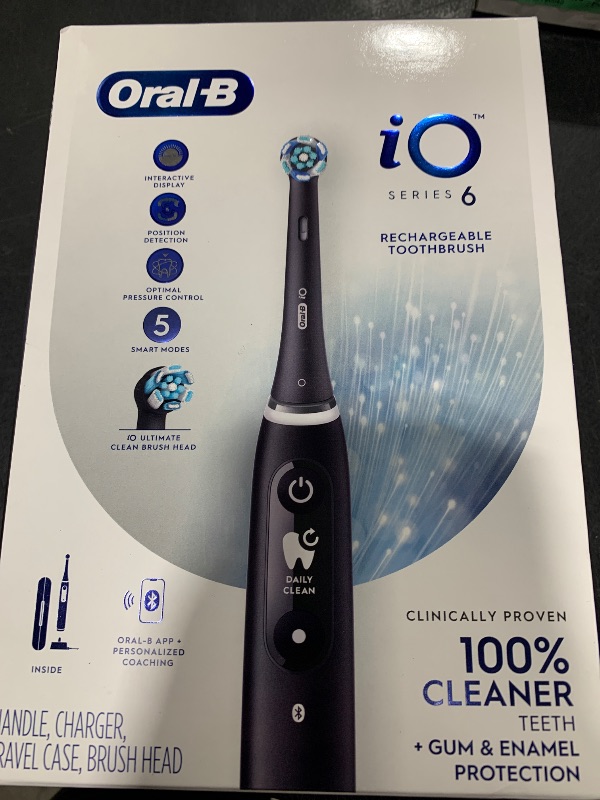 Photo 1 of Oral-B iO Series 6 Rechargeable Electric Toothbrush with Visible Pressure Sensor to Protect Gums, 2 Minute Timer, 5 Cleaning Settings, 1 Replacement Toothbrush Head, and Travel Case, Black