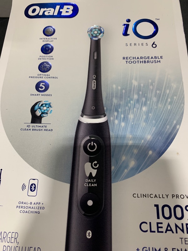 Photo 1 of Oral-B iO Series 6 Rechargeable Electric Toothbrush with Visible Pressure Sensor to Protect Gums, 2 Minute Timer, 5 Cleaning Settings, 1 Replacement Toothbrush Head, and Travel Case, Black
