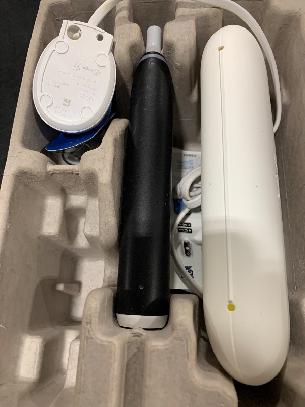 Photo 1 of Oral-B iO Series 6 Rechargeable Electric Toothbrush with Visible Pressure Sensor to Protect Gums, 2 Minute Timer, 5 Cleaning Settings, 1 Replacement Toothbrush Head, and Travel Case, Black