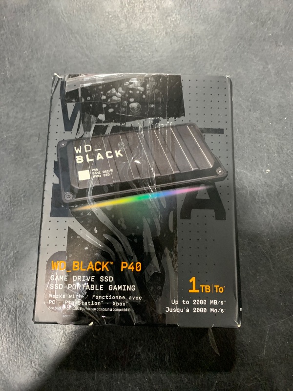 Photo 1 of Western Digital 1TB P40 Game Drive SSD - Up to 2,000MB/s, RGB Lighting, Portable External Solid State Drive , Compatible with Playstation, Xbox, PC, & Mac - WDBAWY0010BBK-WESN