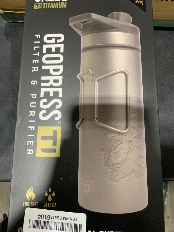 Photo 1 of GRAYL GeoPress Titanium 24 oz Water Purifier Bottle - Filter for Hiking, Camping, Survival, Travel (Covert Black)
