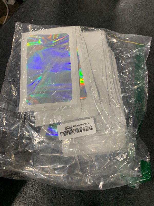 Photo 1 of 100 Pieces Smell Proof Mylar Bags, Holographic Packaging Bags, Resealable Odor Foil Pouch Zipper Bag with Clear Window for Food Storage and Lipgloss, Jewelry Lash (White, 4.3 x 7.5 Inch)