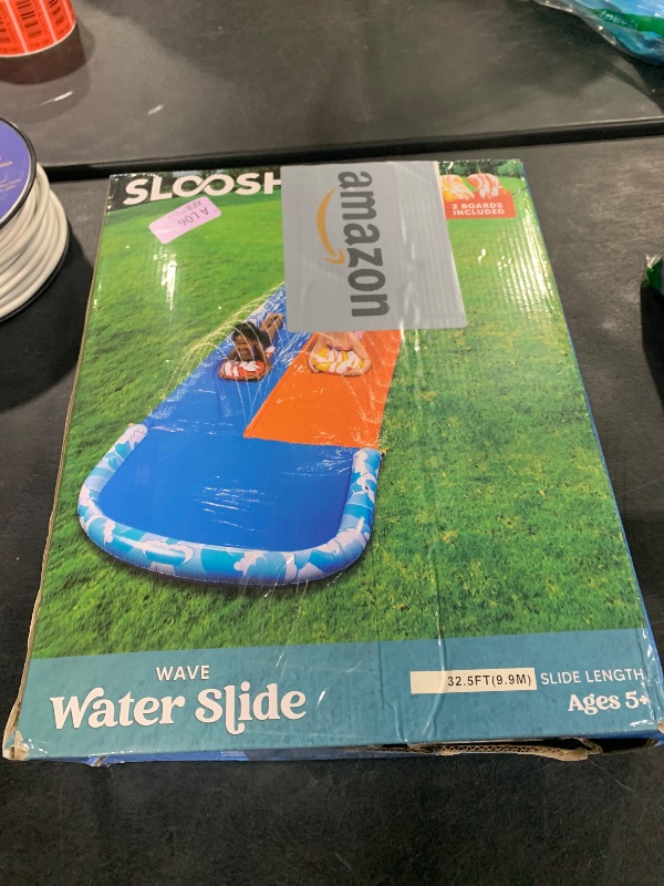 Photo 1 of JOYIN 32.5FT Water Slide and 2 Inflatable Boards, Extra Long Double Lawn Heavy Duty Splash Mat Pad with Sprinkler for Kids Adults Backyard Summer Water Toy Outdoor Fun, Blue, Orange