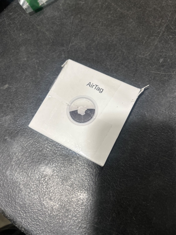 Photo 1 of Apple AirTag. Keep Track of and find Your Keys, Wallet, Luggage, Backpack, and More. Simple one-tap Set up with iPhone or iPad