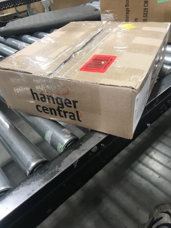 Photo 1 of Hanger Central 25 Pack Heavy Duty Plastic Bottoms Hangers with Ridged Pinch Clips Pants Hangers, 12 Inch, Black