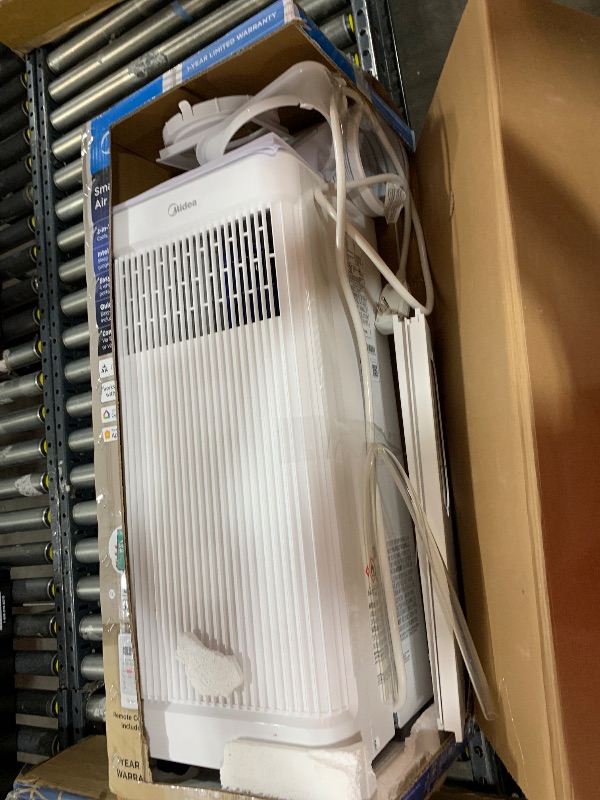 Photo 1 of Midea 10,000 BTU ASHRAE (7,100 BTU SACC) Portable Air Conditioner, Smart Control, Cools up to 300 Sq. Ft., with Dehumidifier & Fan mode, Easy- to-use Remote Control & Window Installation Kit Included
