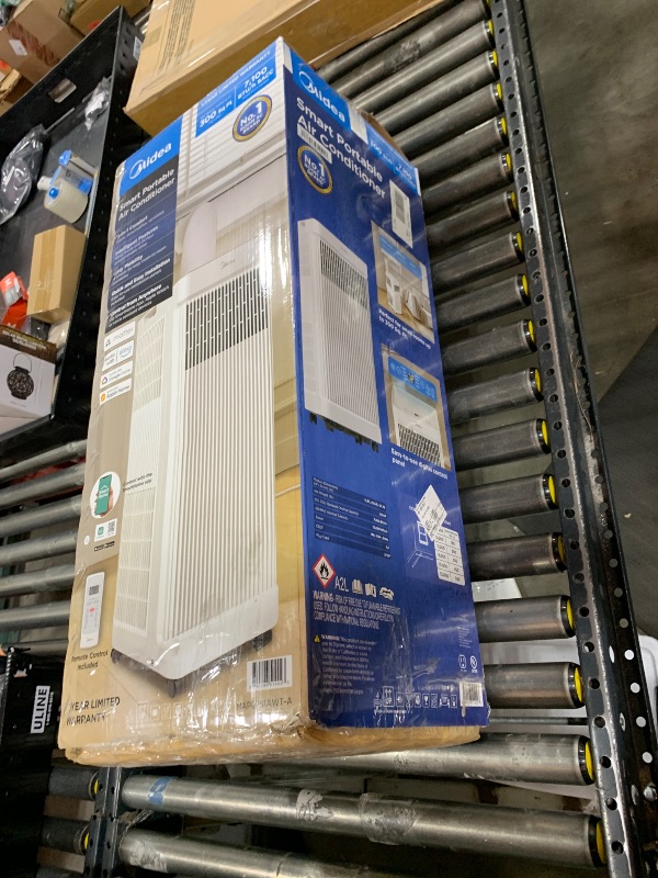 Photo 1 of Midea 10,000 BTU ASHRAE (7,100 BTU SACC) Portable Air Conditioner, Smart Control, Cools up to 300 Sq. Ft., with Dehumidifier & Fan mode, Easy- to-use Remote Control & Window Installation Kit Included