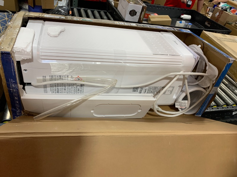 Photo 1 of Midea 10,000 BTU ASHRAE (7,100 BTU SACC) Portable Air Conditioner, Smart Control, Cools up to 300 Sq. Ft., with Dehumidifier & Fan mode, Easy- to-use Remote Control & Window Installation Kit Included