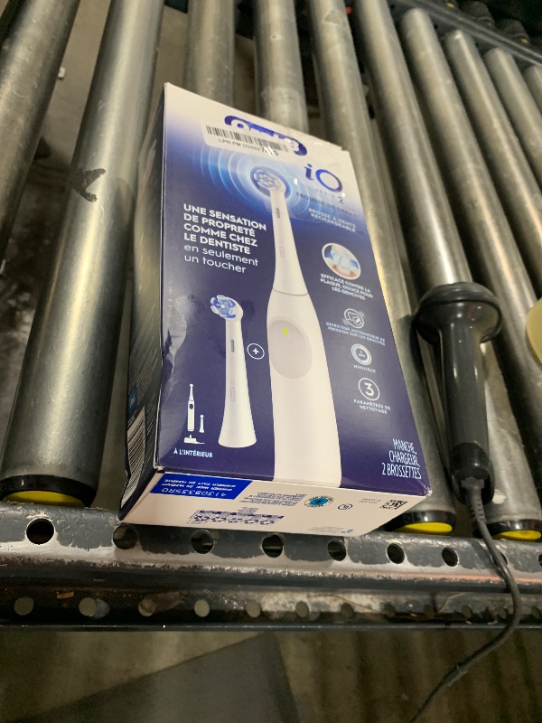 Photo 1 of Oral-B iO Series 2 Rechargeable Electric Powered Toothbrush Starter Kit, Pure White with 2 Brush Heads - Automatic Pressure Sensor to Protect Gums - 3 Modes - 2 Min Timer