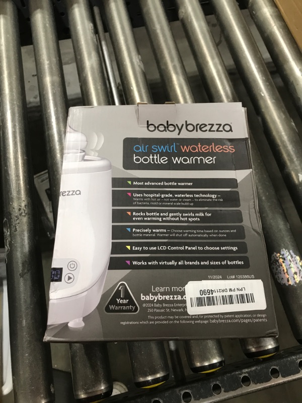 Photo 1 of Baby Brezza AirSwirl Waterless Baby Bottle Warmer - Safely Warm Breastmilk + Formula - Bottles Stay Dry + Nutrients are Protected - Works with Nearly All Bottles