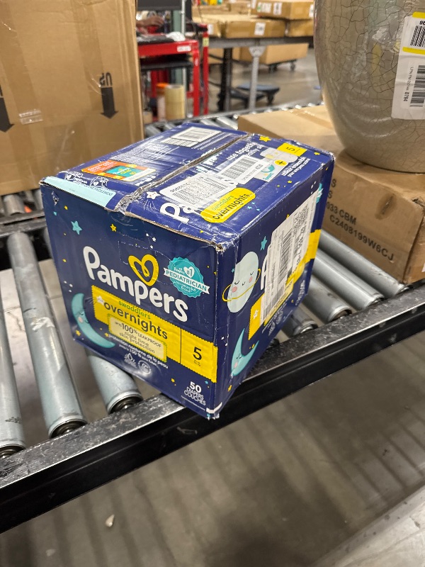 Photo 1 of Pampers Overnight Diapers - Swaddlers Overnights - Size 5, 50 Count, Disposable Baby Diaper, Night Time Leak and Skin Protection