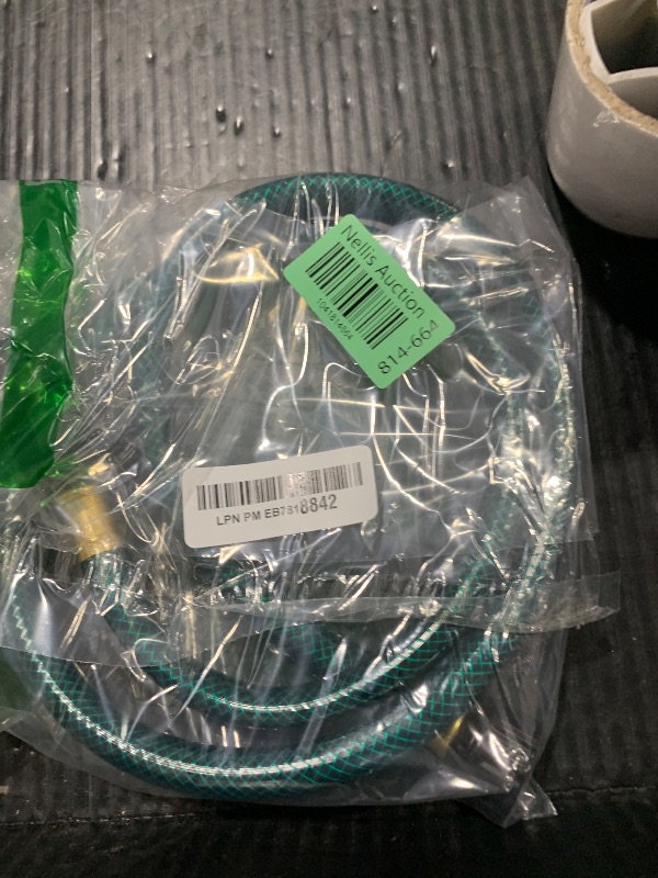 Photo 1 of Garden Hose No Leaking for Watering: No Kink and Lightweight - 1/2" Water Hoses 4 FT with Female and Male Fittings for Outdoor and Yard