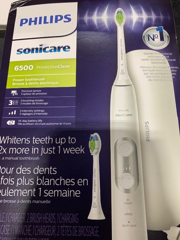 Photo 1 of Philips Sonicare ProtectiveClean 6500 Rechargeable Electric Toothbrush, with Pressure Sensor, 3 Cleaning Modes, SmarTimer and QuadPacer, 14-Day Battery Life, Charging Travel Case, White, HX6462/05