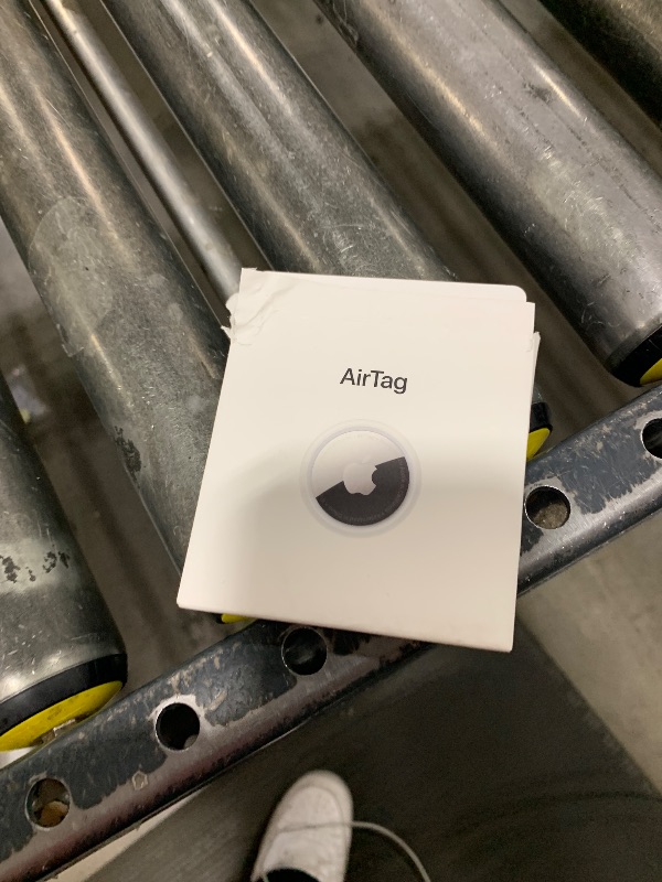 Photo 1 of Apple AirTag. Keep Track of and find Your Keys, Wallet, Luggage, Backpack, and More. Simple one-tap Set up with iPhone or iPad