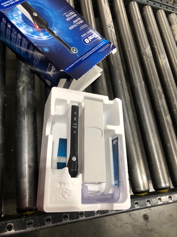 Photo 1 of Oral-B Genius X Limited Rechargeable Electric Toothbrush with 1 Replacement Brush Head, Travel Case, Midnight Black