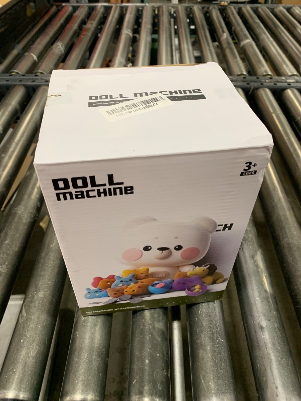 Photo 1 of Claw Machine for Kids, Mini Vending Machine with Game Coins & Music, Prize Dispenser Toys for Girls and Boys, Electronic Claw Game Machine for Party Birthdays, Includes 35 Mini Toys (Doggy Pink)