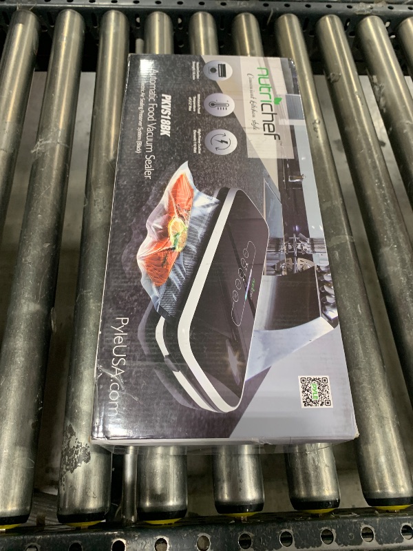 Photo 1 of NutriChef Food Vacuum Sealer Machine - Automatic Air Sealing System for Dry & Moist Foods, LED Touch Controls, Includes Vacuum Bags, Hose & Wine Stopper, High Suction Power, 14"x6"x3", Black