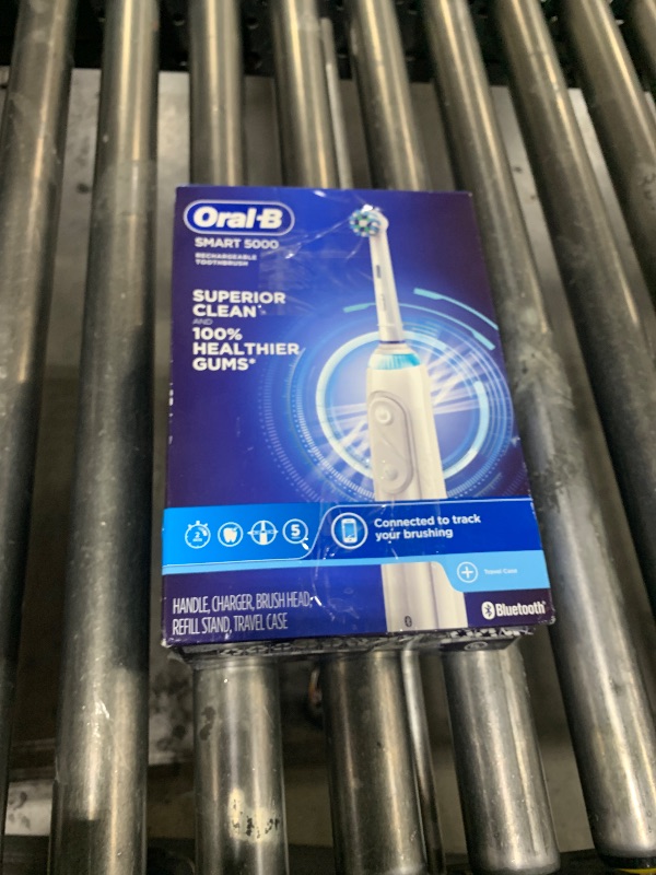 Photo 1 of Oral-B Smart 5000 Rechargeable Electric Powered Toothbrush, Black with Travel Case and Bluetooth - Visible Pressure Sensor to Protect Gums - 5 Cleaning Modes - 2 Minute Timer