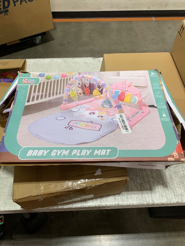 Photo 1 of HOLYFUN Baby Play Mat Baby Gym, Play Piano Tummy Time Mat with Activity Gym, 5 Infant Learning Sensory Baby Toys, Musical Activity Center for Early Development and Entertainment, Pink
