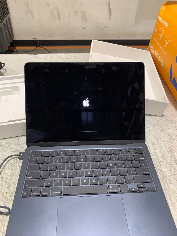 Photo 1 of Apple 2022 MacBook Air Laptop with M2 chip: Built for Apple Intelligence, 13.6-inch Liquid Retina Display, 16GB RAM, 256GB SSD Storage, Backlit Keyboard, 1080p FaceTime HD Camera; Midnight