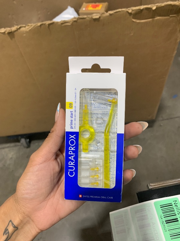 Photo 1 of Curaprox CPS 09 Prime Start Interdental Brushes Set, 5 Interdental Brushes CPS 09 + 1 UHS 409 Holder + 1 UHS 470 Holder, 0.9 mm Diameter, 4 mm Effectiveness, Yellow