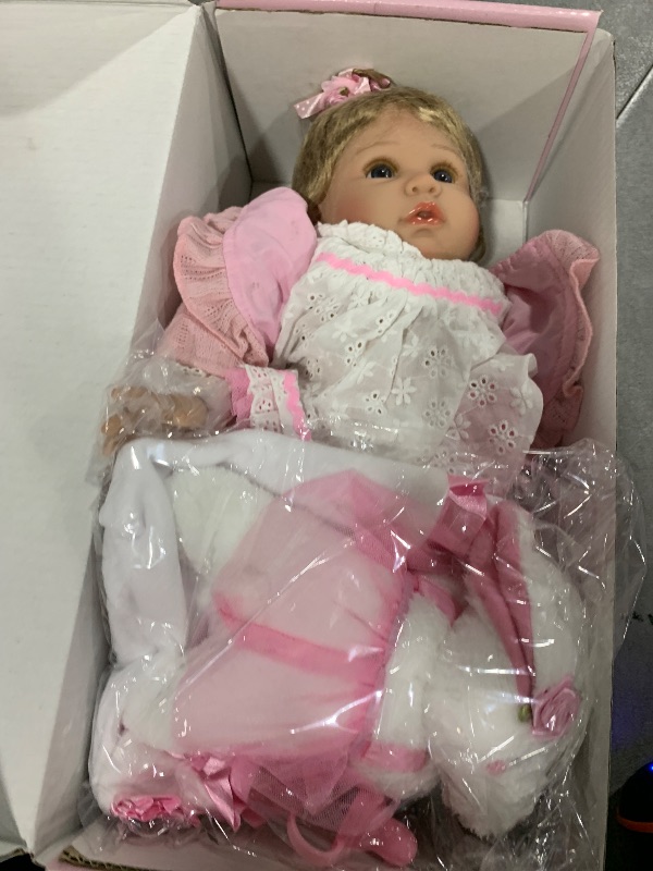 Photo 1 of Aori Reborn Baby Dolls 22 Inch - Realistic Baby Doll for Kids 3+ Years - Lifelike Newborn Baby Girl with Pink Outfit - Handmade Cloth Body Reborn Toddler for Gift, Collection & Role Play