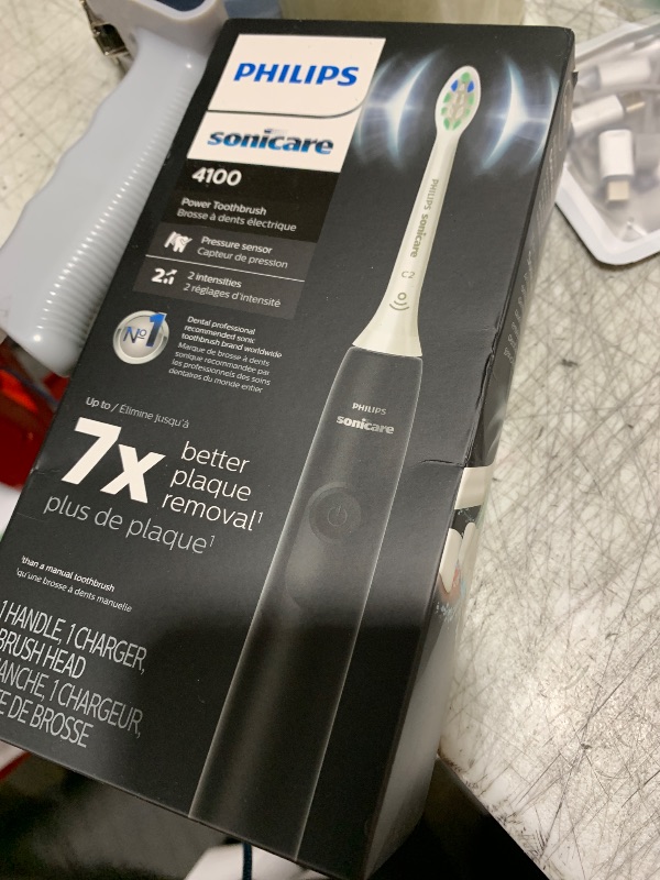 Photo 1 of Philips Sonicare 4100 Rechargeable Electric Toothbrush, with Pressure Sensor, 2 Intensity Settings, SmarTimer and QuadPacer, 14-Day Battery Life, Black, Model HX3681/24