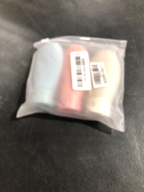 Photo 1 of ZALUJMUS Travel Bottle, 3 Pcs Leak Proof Refillable Squeezable Containers Set(60 ml) with Label and Transparent Carry Bag for Liquid Shampoos, Soap and Toiletries. (Multicolor)