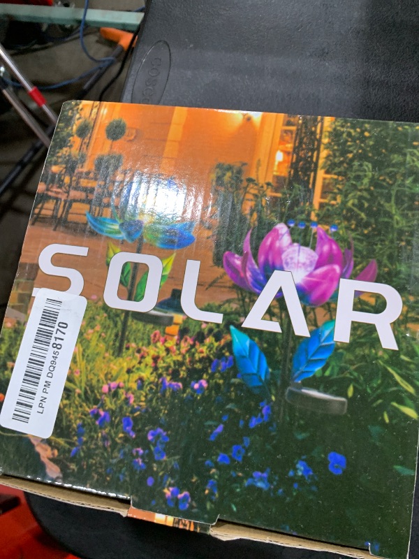 Photo 1 of Solar Garden Lights Metal Flower Decor, Colorful Spinning Windmill Lotus Pathway Ligths with LED Cracked Crystal Ball Outdoor Decorative Stake Lighting Waterproof Flower Sculpture for Patio Yard