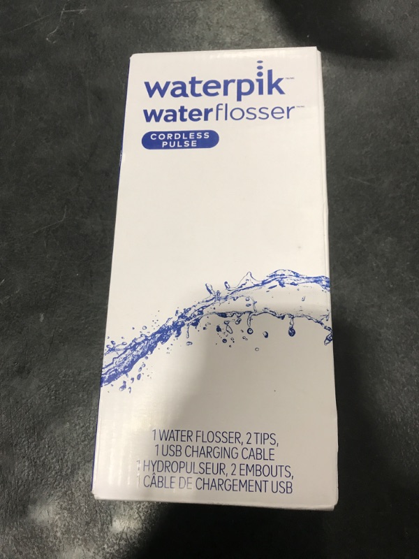 Photo 1 of Waterpik Cordless Pulse Rechargeable Portable Water Flosser for Teeth, Gums, Braces Care and Travel with 2 Flossing Tips, Waterproof, ADA Accepted, WF-20 Gray, Packaging May Vary