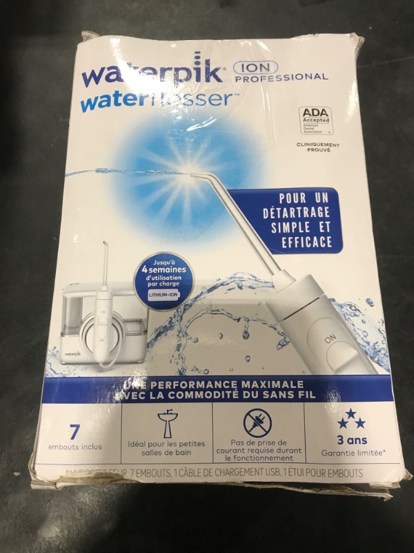 Photo 1 of Waterpik ION Professional Water Flosser, Rechargeable and Portable for Teeth, Gums, Braces, 10 Settings, 7 Flossing Tips For Multiple Users And Needs, ADA Accepted, WF-12 White, Packaging May Vary