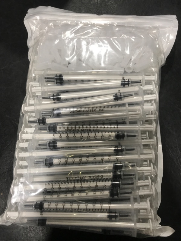 Photo 1 of 100 Pack 1ml Syringe with Cap for Liquid, 1cc Plastic Small Syringes with Cover, Non-Sterile, No Needle