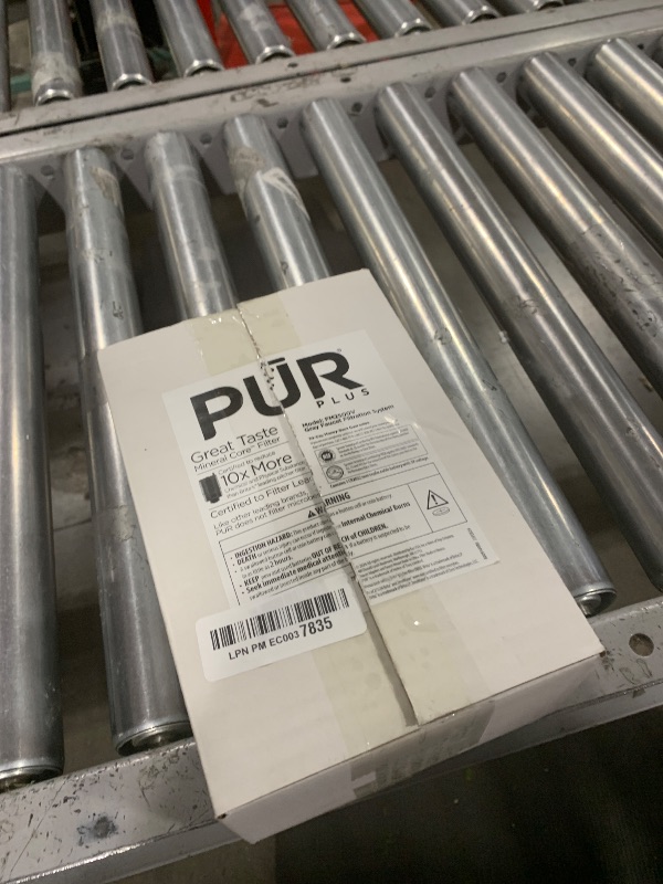 Photo 1 of PUR PLUS Vertical Faucet Mount Water Filtration System, Lead-Reducing Filter, Great-Tasting Water, Easy Install, Lasts 100 Gallons, Compatible with Sinks with External Aerators, Grey