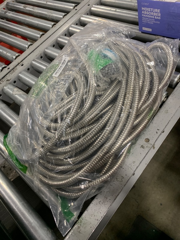 Photo 1 of TVKB Metal Garden Hose 100ft Stainless Steel Water Hose Super Tough Flexible Water Pipe with 3/4 inch Brass Fittings and Sprayer Nozzle, Kink & Tangle Free, Rust Proof