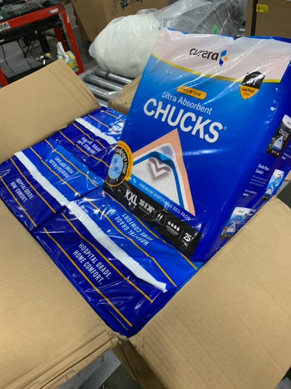 Photo 1 of Curera Chucks Premium Disposable Underpads 30”x36” [100-Count] Ultra Absorbent Chux Incontinence Bed Pads Disposable Adult with Adhesive Tape, Pee Pads Pet Training Pads XX-Large 30x36 Bulk Pack