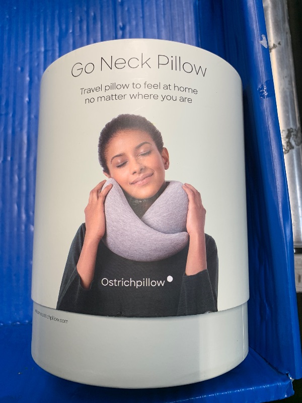 Photo 1 of ***(HEAVILY USED/ MINOR DAMAGE)***Ostrichpillow Go Neck Pillow, Travel Pillows for Airplanes, Premium Memory Foam Travel Pillow, 360º Ergonomic Design, Asymmetrical Sides, Travel Bag Included, Washable Modal Cover
